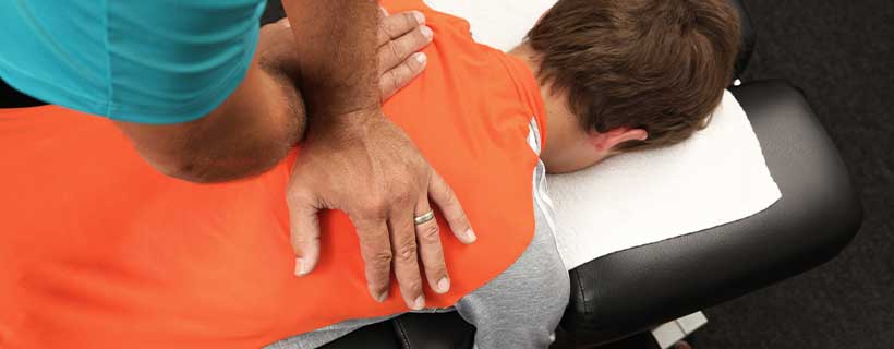 patient receiving drop table chiropractic in El Cerrito CA